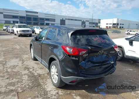 2013 Mazda Cx-5 Touring z USA, uszkodzony, nr VIN JM3KE2CE9D0148142
